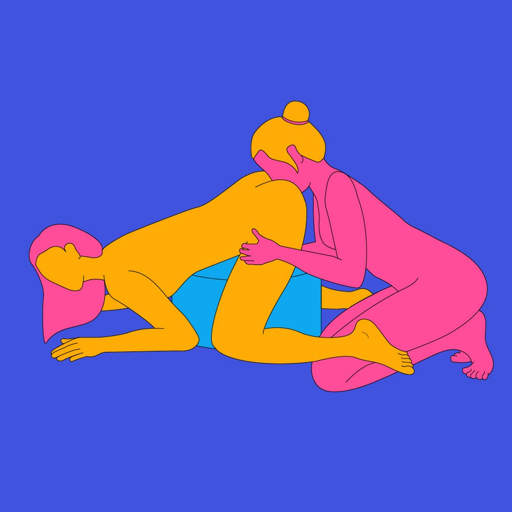 A naked illustrated couple, one is led on a pouffe with legs open and the other is knelt forwards with their face in their lover's butt.